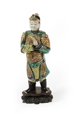Lot 63 - A Chinse Porcelain Figure of a Warrior, Kangxi,...