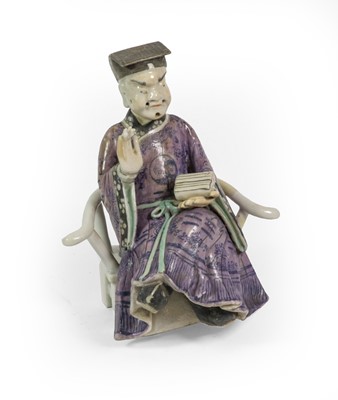 Lot 64 - A Chinese Porcelain Figure of a Dignitary,...