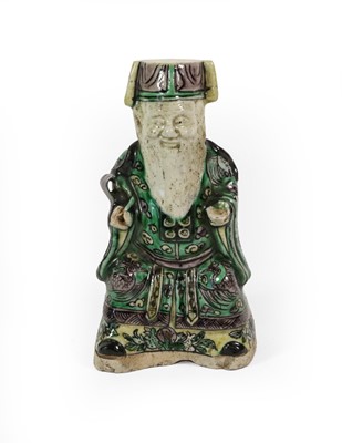 Lot 68 - A Chinese Porcelain Figure on an Immortal,...