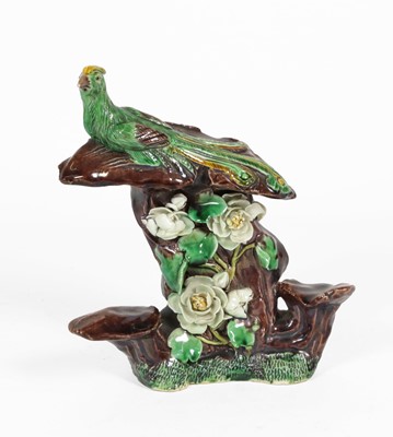 Lot 57 - A Chinese Sancai Porcelain Peacock Group,...