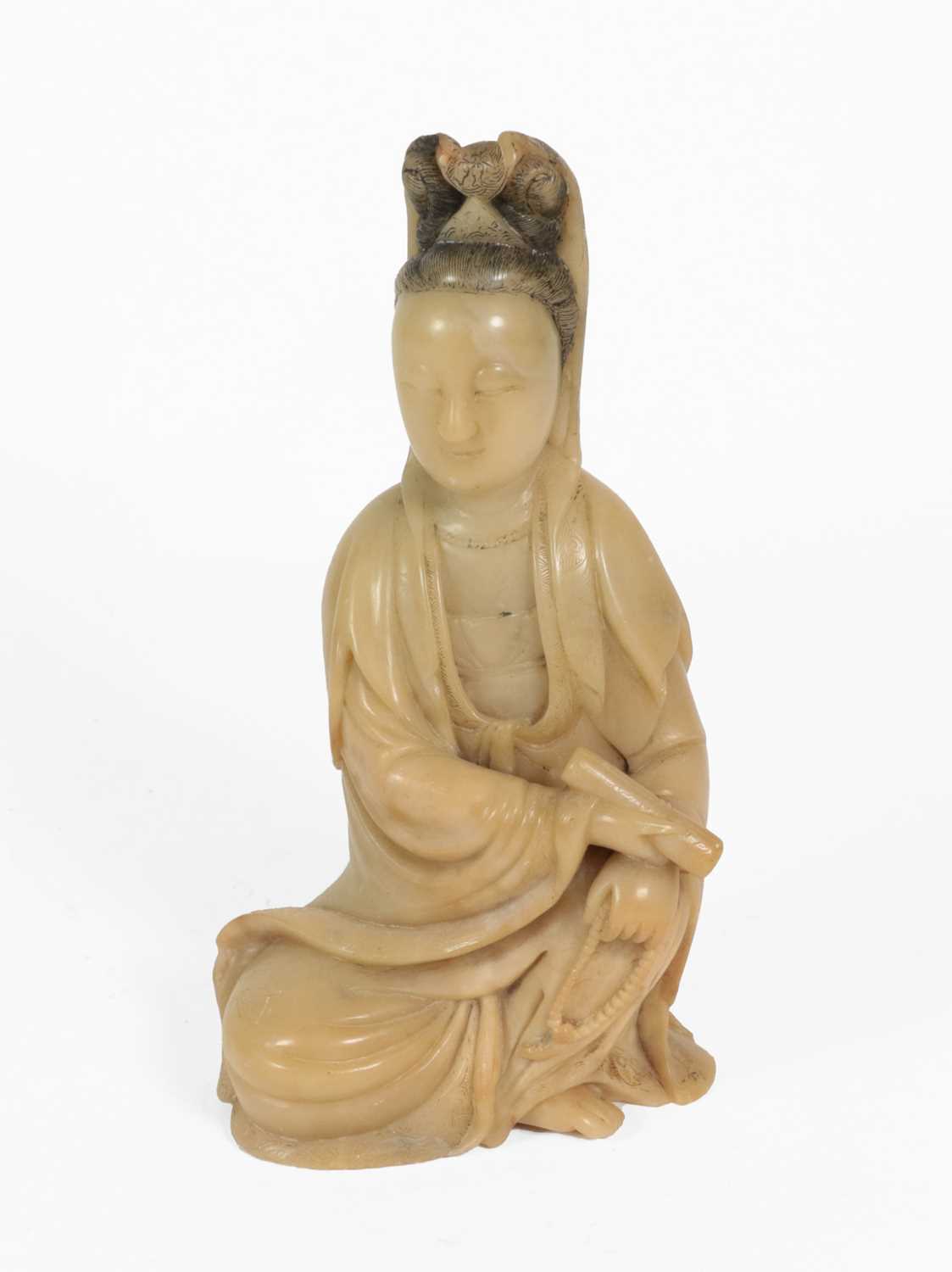 Lot 70 - A Chinese Soapstone Figure of Guanyin, Qing...