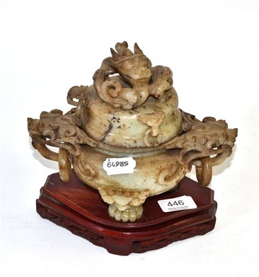 Lot 446 - A Chinese carved hardstone koro and cover, carved and pierced with dragons