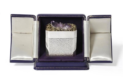 Lot 924 - A Silver Cigarette Canister, designed by David Deakin, the hinged cover mounted with amethyst...