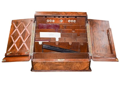 Lot 256 - A Victorian figured walnut stationery cabinet,...