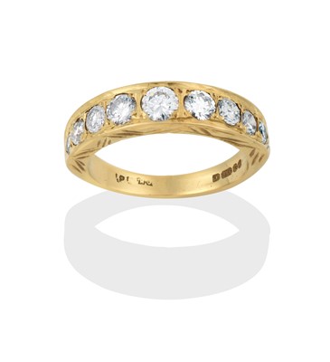 Lot 2301 - An 18 Carat Gold Diamond Half Hoop Ring