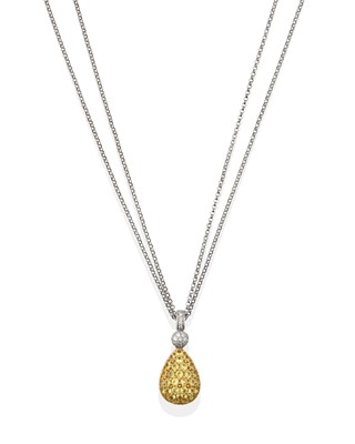 Lot 2349 - A Diamond and Synthetic Yellow Sapphire Pendant on Chain