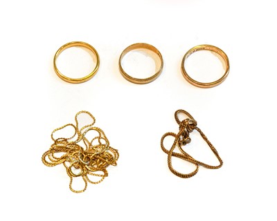 Lot 190 - A 22 carat gold band ring, finger size L1/2;...