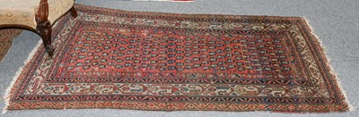 Lot 1120 - A Saroukh rug, the indigo field of flowering...