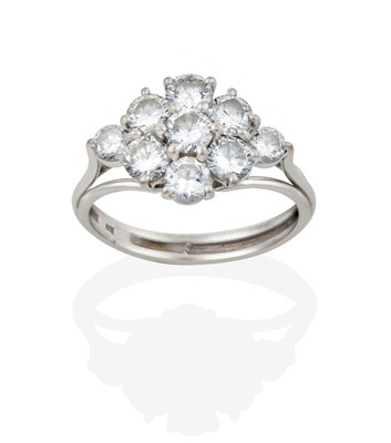 Lot 2424 - An 18 Carat White Gold Diamond Cluster Ring