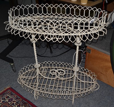 Lot 1116 - A Victorian painted wirework two-tier planter...