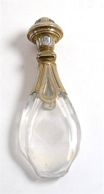 Lot 461 - Oval rock crystal scent bottle with silver? mounts and glass stopper