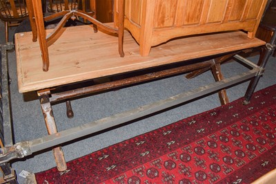 Lot 469 - A pine refectory table on X form supports...