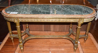 Lot 484 - A Louis XVI style marble topped carved...