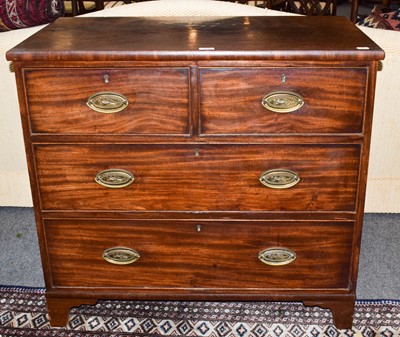 Lot 517 - A Georgian mahogany three height chest of...