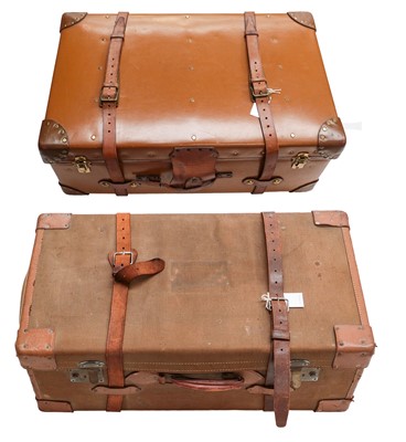 Lot 1077 - A large leather trunk, together with another...