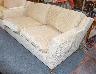 Lot 515 - A modern upholstered three-seater sofa,...