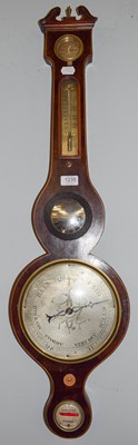 Lot 570 - A string inlaid mahogany wheel barometer with...