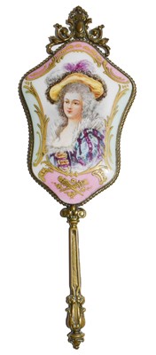 Lot 167 - A Brass Handled Hand-Mirror the shaped mirror...