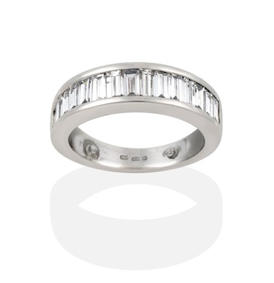 Lot 2422 - A Platinum Diamond Half Hoop Ring