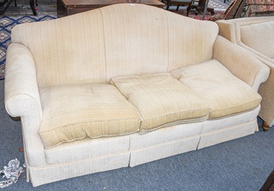 Lot 586 - A modern cream upholstered humpback three...