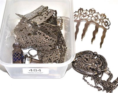 Lot 484 - A silver chatelaine, Birmingham 1901; a silver hair comb, Birmingham 1907; a thimble and...