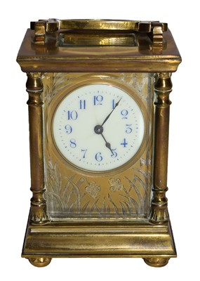 Lot 220 - A brass carriage clock, circa 1900 and a...