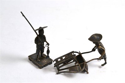 Lot 485 - A Chinese export silver figure of a fisherman and another of a man pushing a cart, both signed