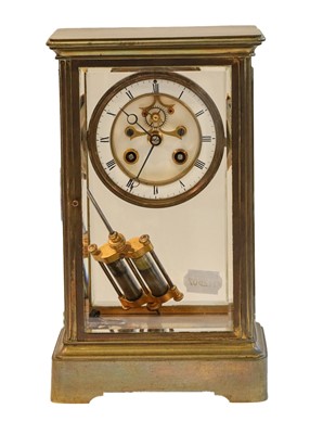 Lot 300 - A brass four glass striking mantel clock,...