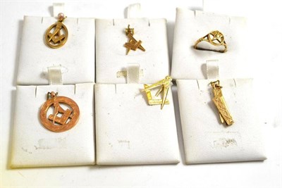 Lot 487 - Four Masonic 9ct gold pendants, a Masonic ring and a yellow metal tie pin