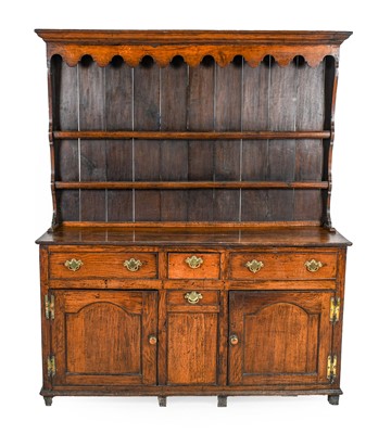 Lot 1378 - ^ A George III Oak Enclosed Dresser and Rack,...