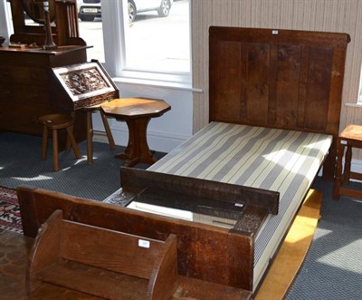 Lot 929 - A 1930's Robert "Mouseman " Thompson Oak 3' Bedstead, the panelled headboard with castellated...