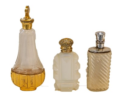 Lot 332 - Three scent bottles, comprising: a gilt-metal...
