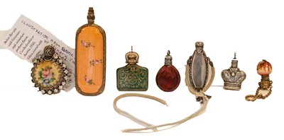 Lot 324 - A collection of seven miniature scent-bottles,...
