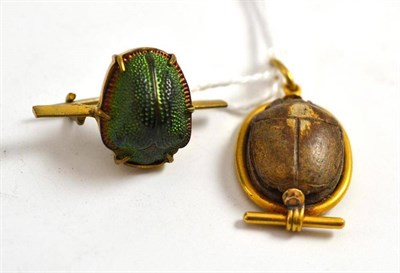 Lot 503 - A scarab brooch and a scarab pendant