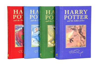 Lot 240 - Rowling (J. K.). Harry Potter and the Philosopher's Stone [-Goblet of Fire], 1999-2000, signed
