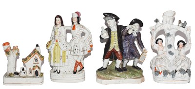 Lot 5 - A Wood type pearlware figure group, Vicar and...