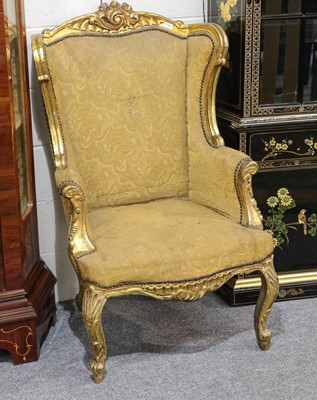 Lot 1068 - A Pair of Louis XV style giltwood armchairs