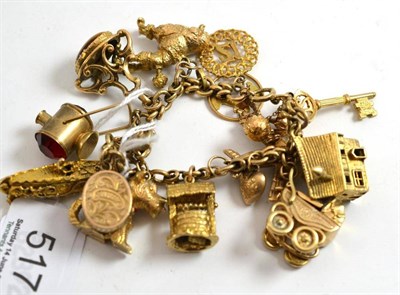 Lot 517 - Charm bracelet, gold