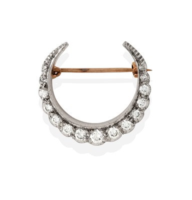 Lot 2285 - A Diamond Crescent Brooch, set throughout with...