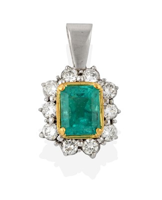 Lot 2380 - An Emerald and Diamond Cluster Pendant, the...