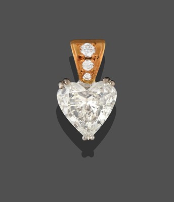 Lot 2402 - An 18 Carat Gold Diamond Pendant, the heart...