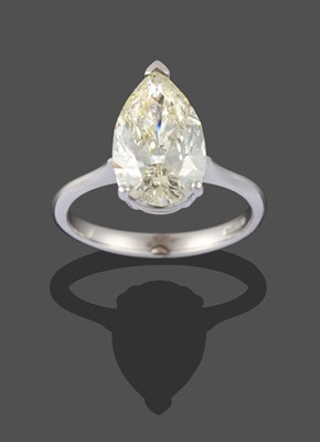 Lot 2403 - An 18 Carat White Gold Diamond Solitaire Ring,...