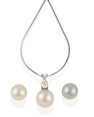 Lot 2378 - A Diamond and Cultured Pearl Pendant on Chain,...