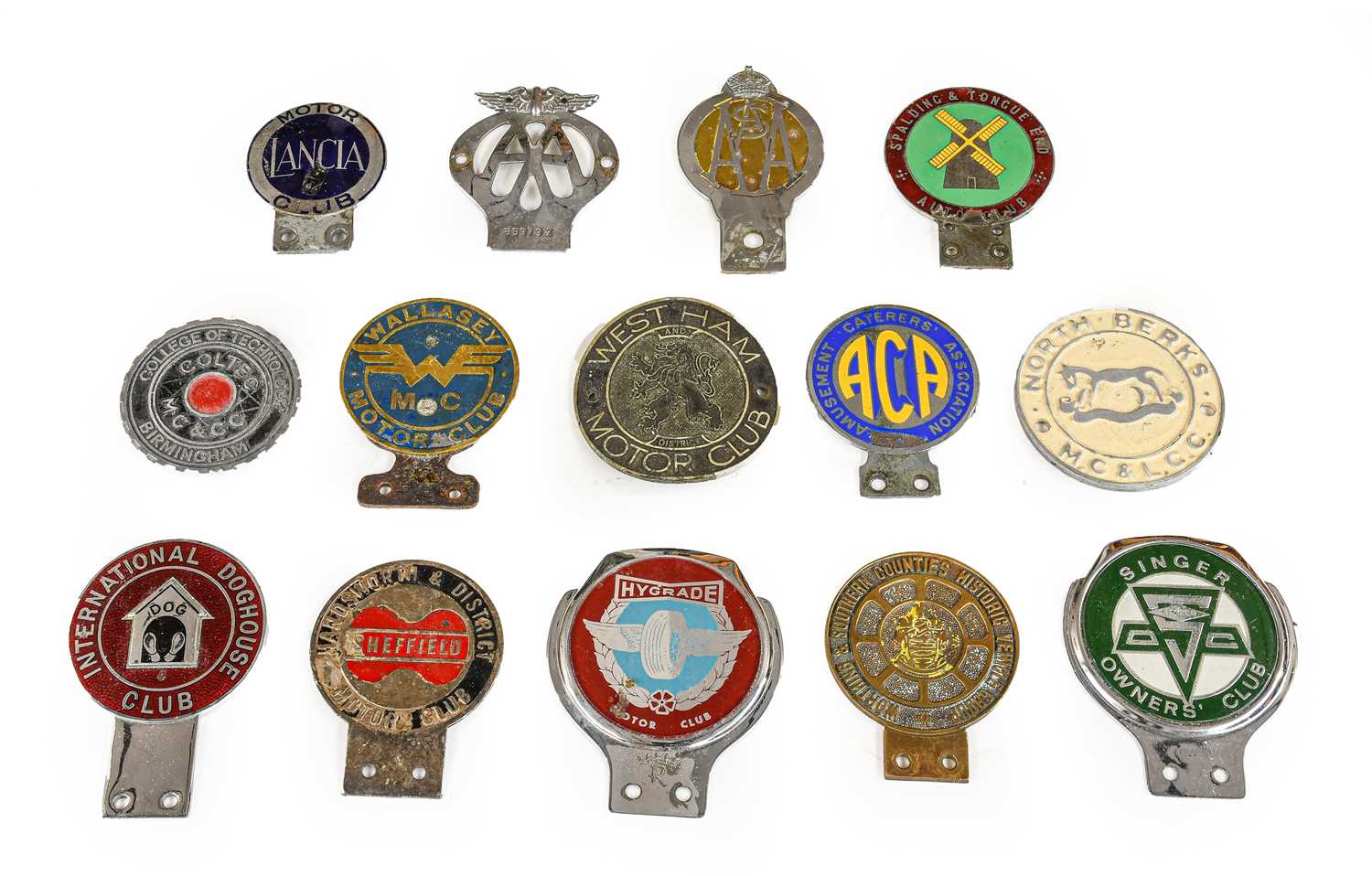 Lot 44 - Fourteen Chrome and Brass Car Badges, to...