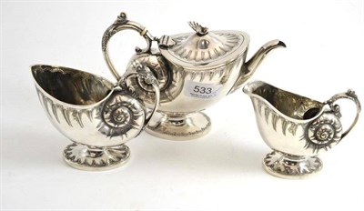 Lot 533 - A three piece silver plated bachelor tea service, date mark for 1880, each piece formed as a shell