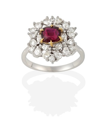 Lot 2284 - A Ruby and Diamond Cluster Ring, the cushion...
