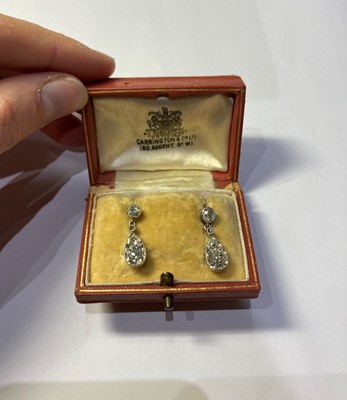 Lot 2289 - A Pair of Diamond Drop Earrings, the pear...