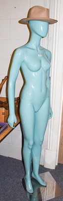 Lot 337 - A turquoise shop mannequin of a woman wearing...