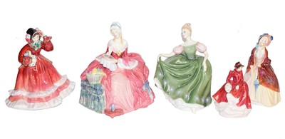 Lot 13 - A quantity of Royal Doulton porcelain figures...