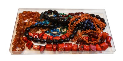 Lot 197 - A collection of bead necklaces, including a...